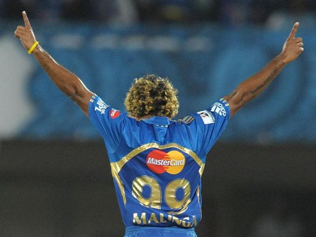 Latish Malinga celebrates the wicket of Deccan Chargers batsman Shikar Dhawan during the IPL match between at Dr YS Rajasekhara Reddy Cricket Stadium in Visakhapatnam. (AFP Photo)