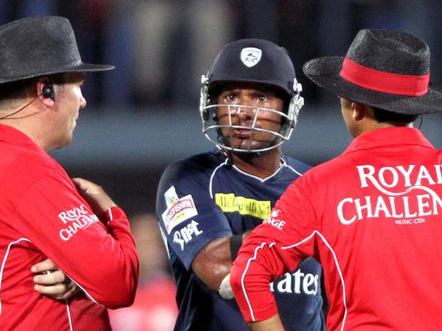 Kumara Sangakkara of Deccan Chargers questions the umpire regarding his bowled out against Mumbai Indians during IPL 5 at YSR Stadium, Vishakhapatnam. (HT Photo/ Subhendu Ghosh)