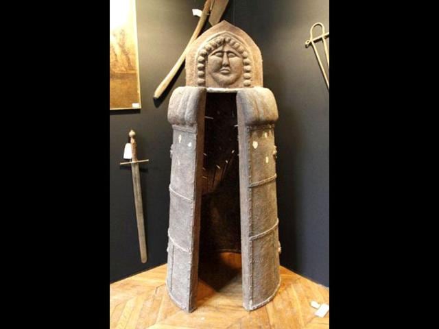 The sale of instruments of torture that once belonged to Fernand Meyssonnier, a 20th century French executioner was suspended "in a spirit of appeasement" said the French Cornette de Saint Cyr house. (AFP Photo)