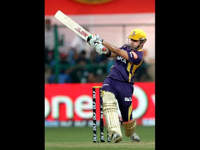 Kolkata Knight Riders' Gautam Gambhir plays a shot against Royal Challengers Bangalore during their IPL 5 match in Bangalore. PTI Photo/Shailendra Bhoja