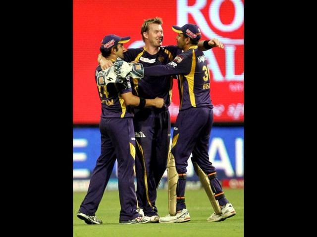 Kolkata Knight Riders' skipper Gautam Gambhir and Brett Lee celebrate win over Royal Challengers Bangalore during their IPL 5 match in Bengalore. PTI Photo/Shailendra Bhojak