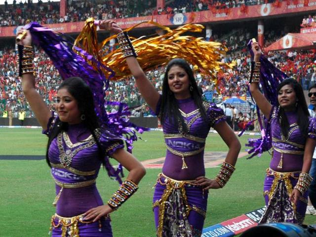 Kolkata Knight Riders cheerleaders perform during the IPL 5 match at M Chinnaswamy stadium in Bangalore. Agency