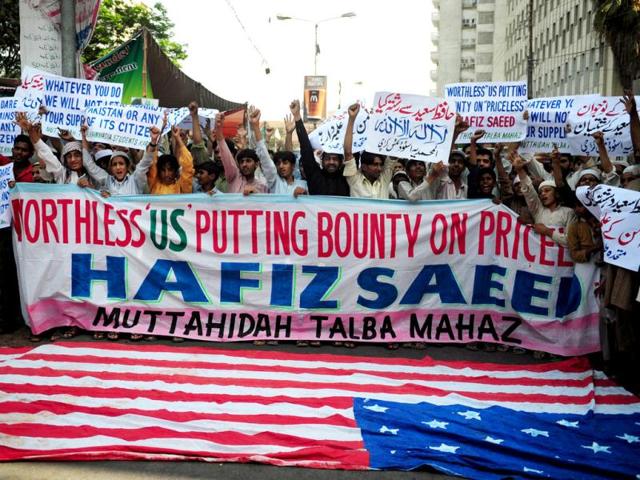Pakistani religious students of Muttahida Talba Mahaz, shout anti-US slogans during a protest rally in Karachi. Protesters condemned a $10 million bounty slapped on the founder of a terror group. The Defence Council of Pakistan, an alliance of right-wing, religious and extremist groups, organised the rallies to denounce the move against Hafiz Saeed, whose Lashkar-e-Taiba group was blamed for the 2008 Mumbai attacks. (AFP Photo)