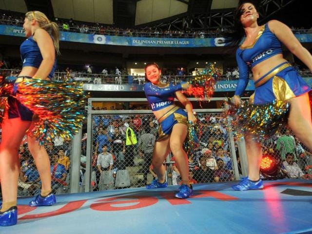 Mumbai Indians' cheerleaders dance to a popular Bollywood number before the start of the IPL Twenty20 cricket match between Rajasthan Royals and Mumbai Indians at The Wankhede Stadium in Mumbai. AFP Photo/Indranil Mukherjee