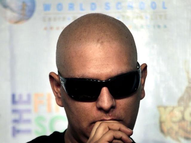 Yuvraj Singh gestures during a press conference about his battle with cancer, in Gurgaon. (AP Photo/Manish Swarup)