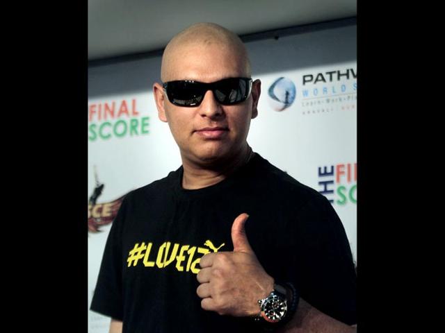 Cricketer Yuvraj Singh gestures after a press conference about his battle with cancer, in Gurgaon. (AP Photo/Manish Swarup)