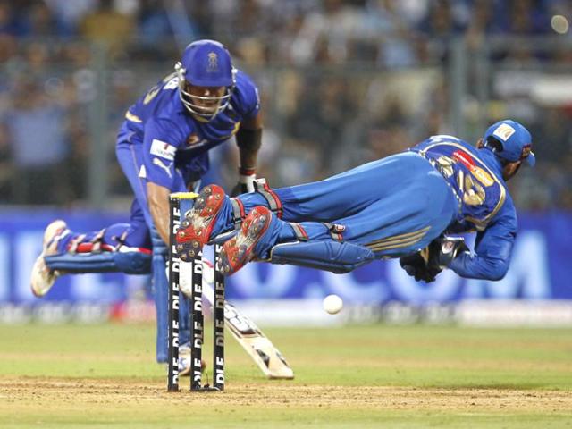 Mumbai Indian wicket keeper Dinesh Kartik attempts to stump out Rajasthan Royals batsman Owais shah during the IPL T20 match between Mumbai Indians and Rajasthan Royals at Wankhade Stadium, in Mumbai . HT photo/Vijayanand Gupta