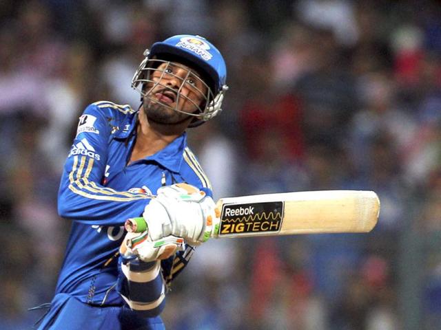 Mumbai Indians Captain Harbhajan Singh plays a shot against Rajasthan Royals during their IPL-5 match in Mumbai .PTI Photo/Shirish Shete