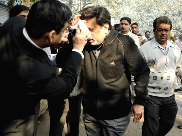 On January 25, 2011, Rajesh Talwar, was attacked outside court with a cleaver by a youth called Utsav Sharma. (HT photos)