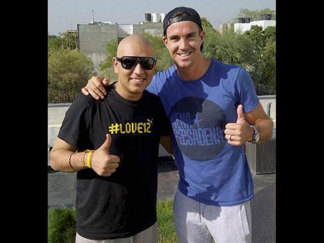 Cricketer Yuvraj Singh poses with England cricket player Kevin Pietersen in Gurgaon. PTI Photo/ Twitter