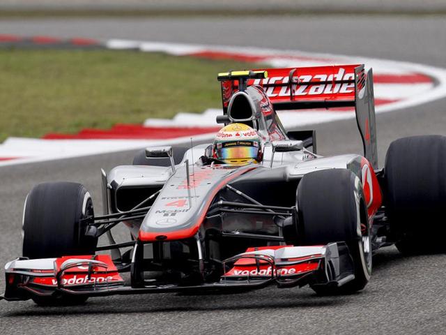 McLaren Formula One driver Lewis Hamilton of Britain steers his car during practice for the Chinese Grand Prix in Shanghai, China. AP/Andy Wong