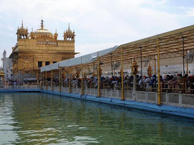 Sikh devotees pay their respects to mark the Baisakhi festival at the Golden temple in Amritsar. AFP/Narinder Nanu