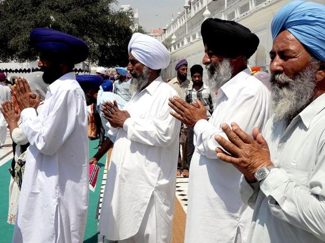 Sikh devotees are seen at the Golden temple in Amritsar on Baisakhi. AFP/Narinder Nanu