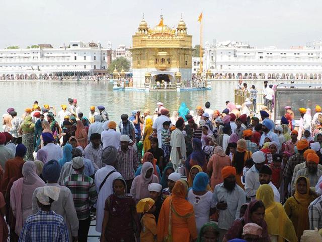 Devotees pay their respects at the Golden temple in Amritsar. AFP/Narinder Nanu