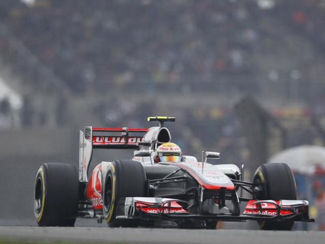 McLaren Formula One driver Lewis Hamilton of Britain takes a corner during the qualifying session for the Chinese Grand Prix in Shanghai. AP/Greg Baker