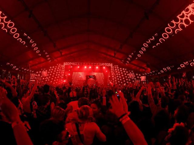 Music fans attend the 2012 Coachella Valley Music and Arts Festival held at The Empire Polo Field in Indio, California. (AFP/Christopher Polk)
