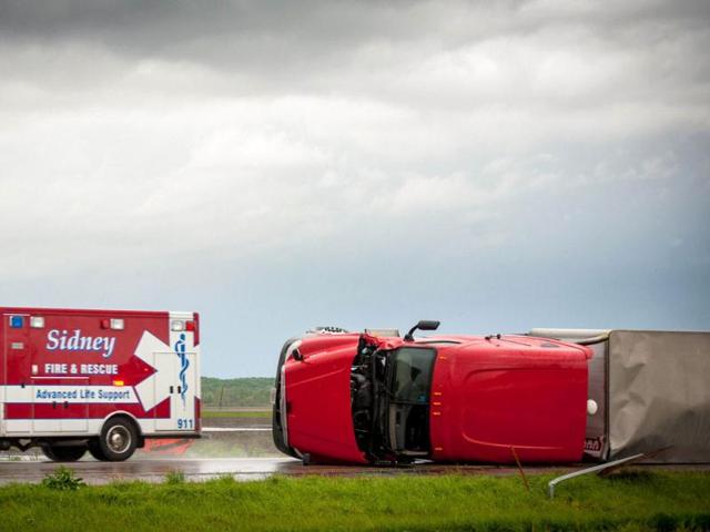 Several semi trucks and their trailers are overturned on Interstate in Thurman, Iowa. The storms were part of a massive system that affected areas from Northern Nebraska south through Oklahoma. Eric Francis/Getty Images/AFP