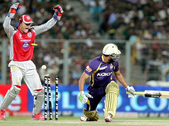Kolkata Knight Riders' Yusuf Pathan is bowled out against Kings XI Punjab during their IPL-5 match in Kolkata. PTI/Ashok Bhaumik