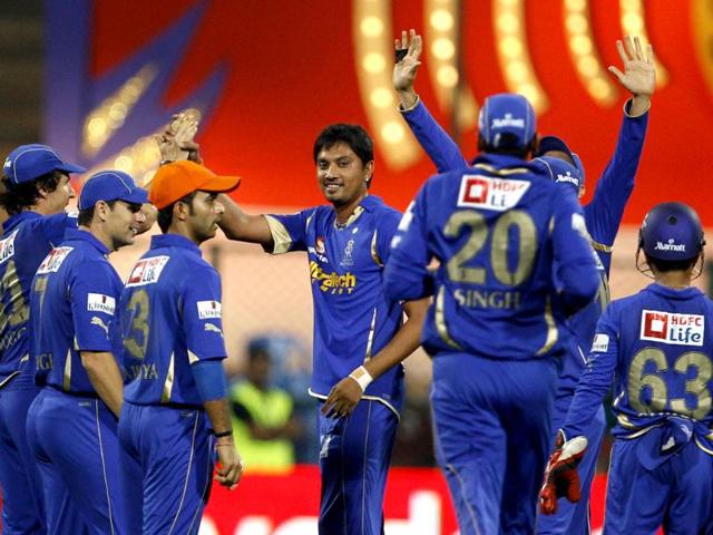 Rajasthan Royals bowler Siddharth Trivedi celebrates with teammates after taking the wicket of Royal Challengers Bangalore batsman Virat Kohli, during their Indian Premier League cricket match in Bangalore. AP/Aijaz Rahi