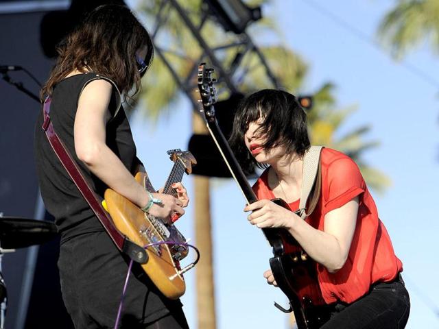 Mary Timony, left, and Carrie Brownstein of Wild Flag perform during the first weekend of the 2012 Coachella Valley Music and Arts Festival in Indio, California. (AP Photo/Chris Pizzello)