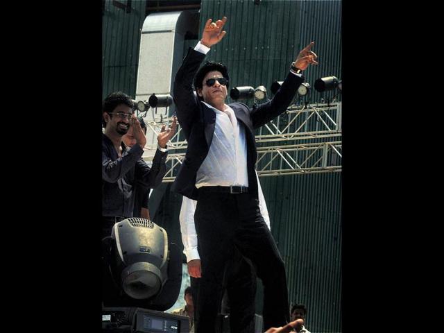 SRK does what looks like a bhangra dance.