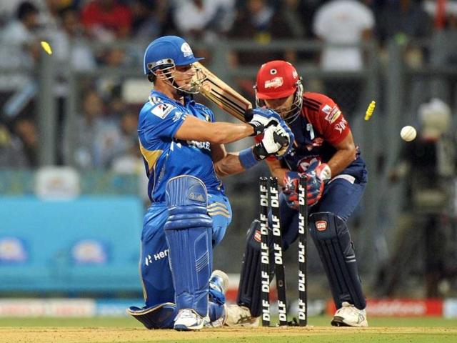 Mumbai Indians batsman Davy Jacobs (L) is clean bowled during the IPL Twenty20 cricket match between Mumbai Indians and Delhi Daredevils at the Wankhede Stadium in Mumbai. AFP Photo/Punit Paranjpe