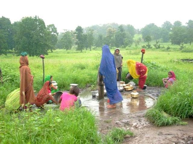 Villages have a common water source. Women spend long hours ferrying water to their homes.