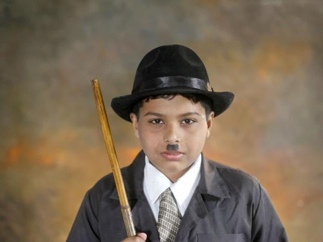 Affron, 13, poses inside a studio during Chaplin's birthday celebrations in Adipur in Gujarat. Reuters/Danish Siddiqui