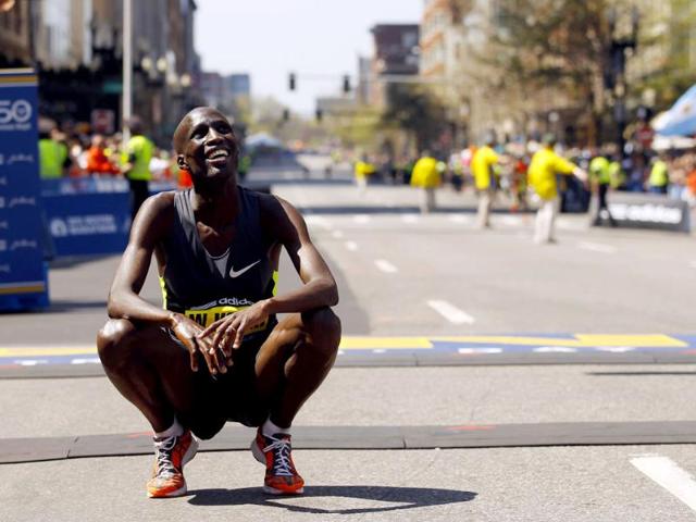 Wesley Korir of Kenya smiles after crossing the finish line to win the men's division of the 116th Boston Marathon in Boston, Massachusetts. (Reuters/Brian Snyder)