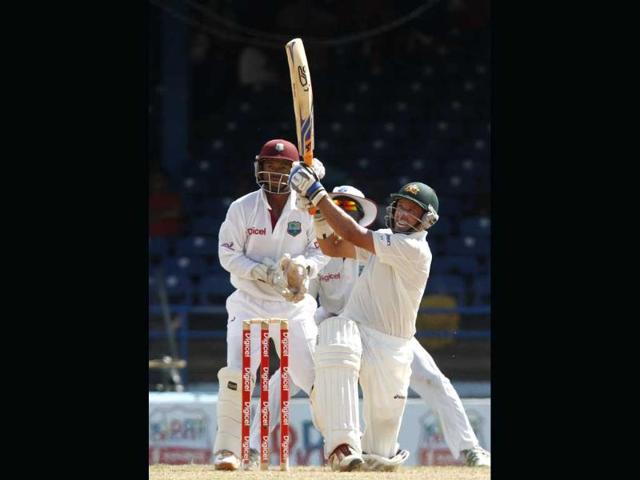 Australia's Michael Hussey plays a shot for six runs during the second day of the second cricket Test match against the West indies in Port of Spain, Trinidad. AP/Arnulfo Franco