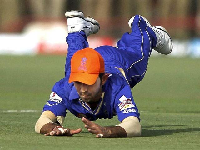 Rajasthan Royals' Ajinkya Rahane dives to stop the ball while fielding against Deccan Chargers during their IPL-5 match in Jaipur. PTI/Aman Sharma