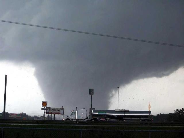 In this file photo, a tornado moves through Tuscaloosa, Alabama. The Tuscaloosa News won a Pulitzer Prize in Breaking News Reporting for their coverage of the April 27, 2011 tornado that destroyed much of Tuscaloosa. AP/The Tuscaloosa News, Dusty Compton