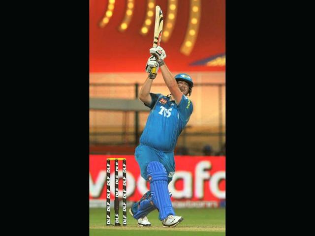 Pune Warriors batsman Jesse Ryder sends one to the boundary during the IPL Twenty20 cricket match against Royal Challengers Bangalore at the M Chinnaswamy Stadium in Bangalore. AFP/Manjunath Kiran