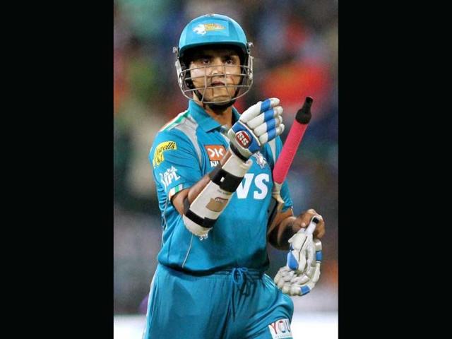 Pune Warriors skipper Sourav Ganguly returns to the pavilion after his dismissal against Royal Challengers Bangalore during an IPL 5 match at Chinnaswamy stadium in Bengaluru. PTI/Shailendra Bhojak