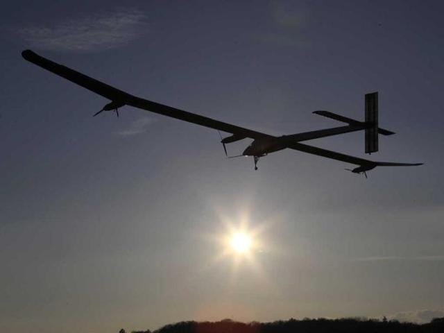 Solar Impulse project president and pilot Bertrand Piccard takes off with the solar-powered HB-SIA prototype airplane during a test flight at Payerne airport. The Solar Impulse HB-SIA, which has 12,000 solar cells built into its 64.3-meter (193-foot) wings, is a prototype for an aircraft that its creators hope will carry out its first circumnavigation of the globe from 2014. Reuters/Denis Balibouse