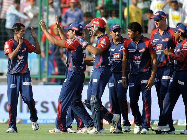 Delhi Daredevils cricketer Shahbaz Nadeem (L) celebrates with teammates after taking the wicket of Deccan Chargers batsman Parthiv Patel during the IPL-5 match in New Delhi. AFP Photo/Manan Vatsyayana