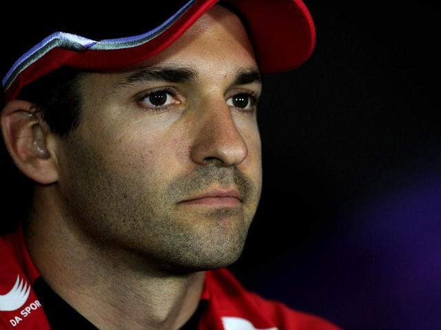 Marussia F1 Team's German driver Timo Glock sits during a press conference at the Bahrain international circuit in Manama ahead of the Bahrain Formula One Grand Prix. The Bahrain GP was canceled last year due to anti-government protests. AFP/Dimitar Dilkoff