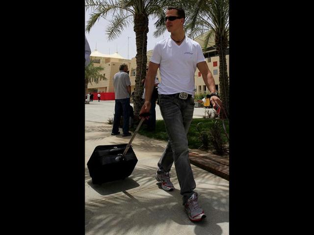 Mercedes Grand Prix driver Michael Schumacher of Germany arrives at the Formula One Bahrain International Circuit in Sakhir, Bahrain. The Bahrain GP was canceled last year due to anti-government protests. AP/Luca Bruno