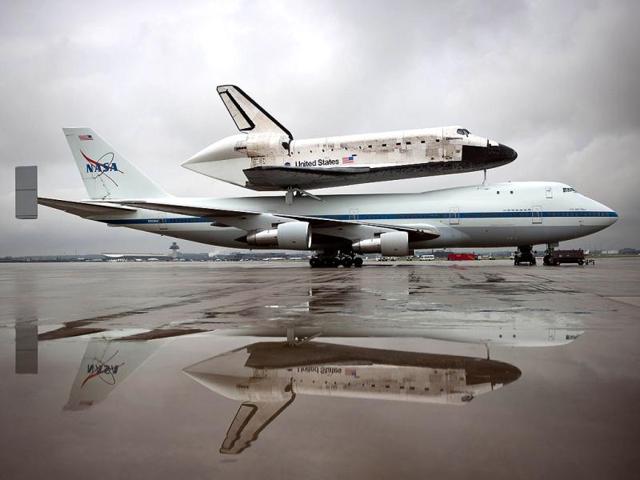 The US Space shuttle Discovery, mounted atop a NASA 747 Shuttle Carrier Aircraft (SCA), is seen a few hours before being demated at Washington Dulles International Airport. (AFP Photo)