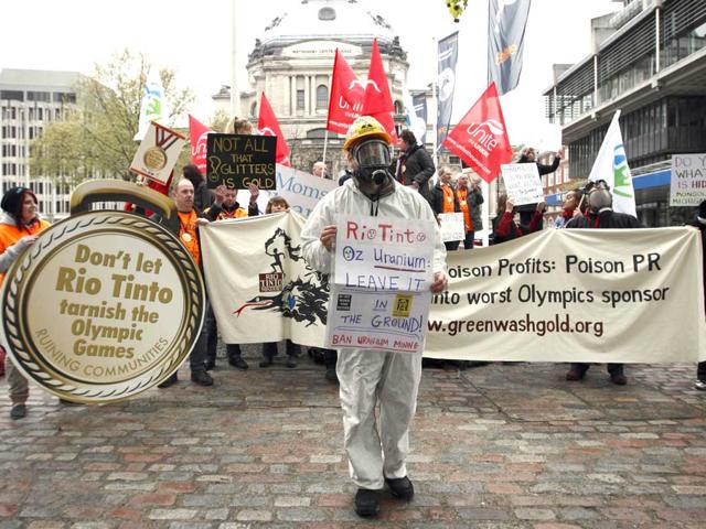 Protesters outside the Rio Tinto AGM at the Queen Elizabeth II conference centre demonstrate against the company's sponsorship of the London 2012 Olympic Games. Mining unions have urged the London 2012 Olympic committee to drop resources giant Rio Tinto as its medals supplier and official sponsor due to an ongoing dispute with workers in Canada. (AFP/Justin Tallis)