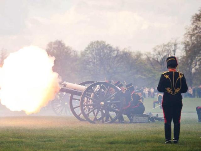Gun teams from the Kings Troop of the Royal artillery fire a 41 gun salute in London's Hyde Park in honour of her Royal Highness Queen Elizabeth II's 86th birthday in central London. AFP Photo / Leon Neal