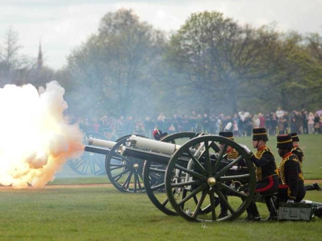 Gun teams from the The Kings Troop of the Royal artillery fire a 41 gun salute in London's Hyde Park in honour of her Royal Highness Queen Elizabeth II's 86th birthday in central London. AFP Photo / Leon Neal