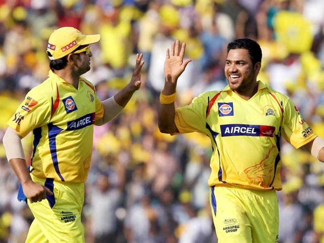 Chennai Super Kings' Shadab Jakati along with Suresh Raina celebrating the wicket Rahul Dravid during the IPL-5 match in Chennai. (PTI Photo/R Senthil Kumar)