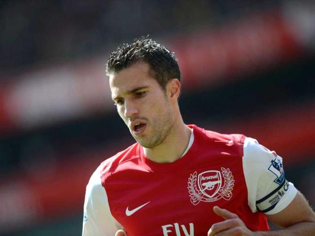 Arsenal's Dutch striker Robin Van Persie looks on during the English Premier League football match between Arsenal and Chelsea at The Emirates Stadium in north London, England. (AFP Photo/Adrian Dennis)