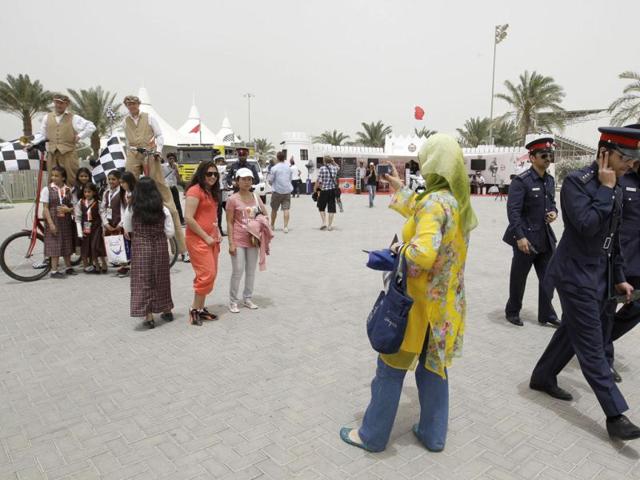 Bahraini policemen, patrol ahead of the Formula One Grand Prix at the Bahrain International Circuit in Sakhir, Bahrain. (AP Photo/Hassan Ammar)