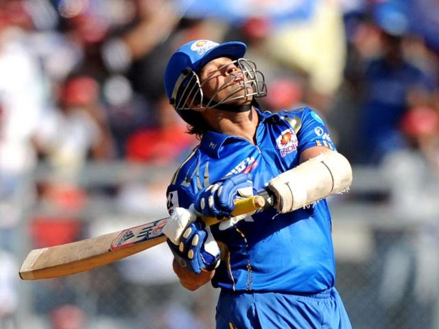 Sachin Tendulkar reacts after missing a shot during the IPL Twenty20 cricket match in Mumbai. (AFP Photo/Indranil Mukherjee)