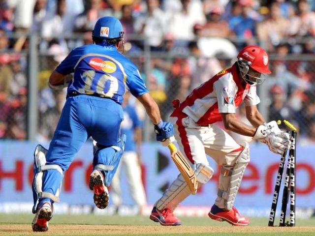 Sachin Tendulkar is run out by Kings XI Punjab wicket keeper Nitin Saini during the IPL Twenty20 cricket match in Mumbai. (AFP Photo/Indranil Mukherjee)