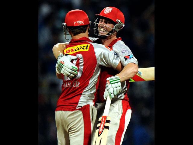 Kings XI Punjab batsmen David Miller and Shaun Marsh celebrate after winning the IPL Twenty20 cricket match between Mumbai Indians and Kings XI Punjab at the Wankhede Stadium in Mumbai. (AFP Photo/Indranil Mukherjee)
