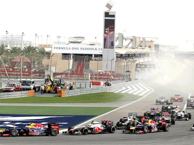 Red Bull driver Sebastian Vettel of Germany, leads the field after the start during the Bahrain Formula One Grand Prix at the Formula One Bahrain International Circuit in Sakhir, Bahrain. (AP Photo/Luca Bruno)