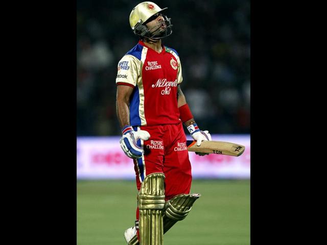 Royal Challegers Bangalore player Virat Kohli reacts after his dismissal by Pankaj Singh during IPL 5 cricket match between Rajasthan Royals and Royal Challengers Bangalore at the Sawai Mansingh Stadium in Jaipur. HT PhotoSanjeev Verma